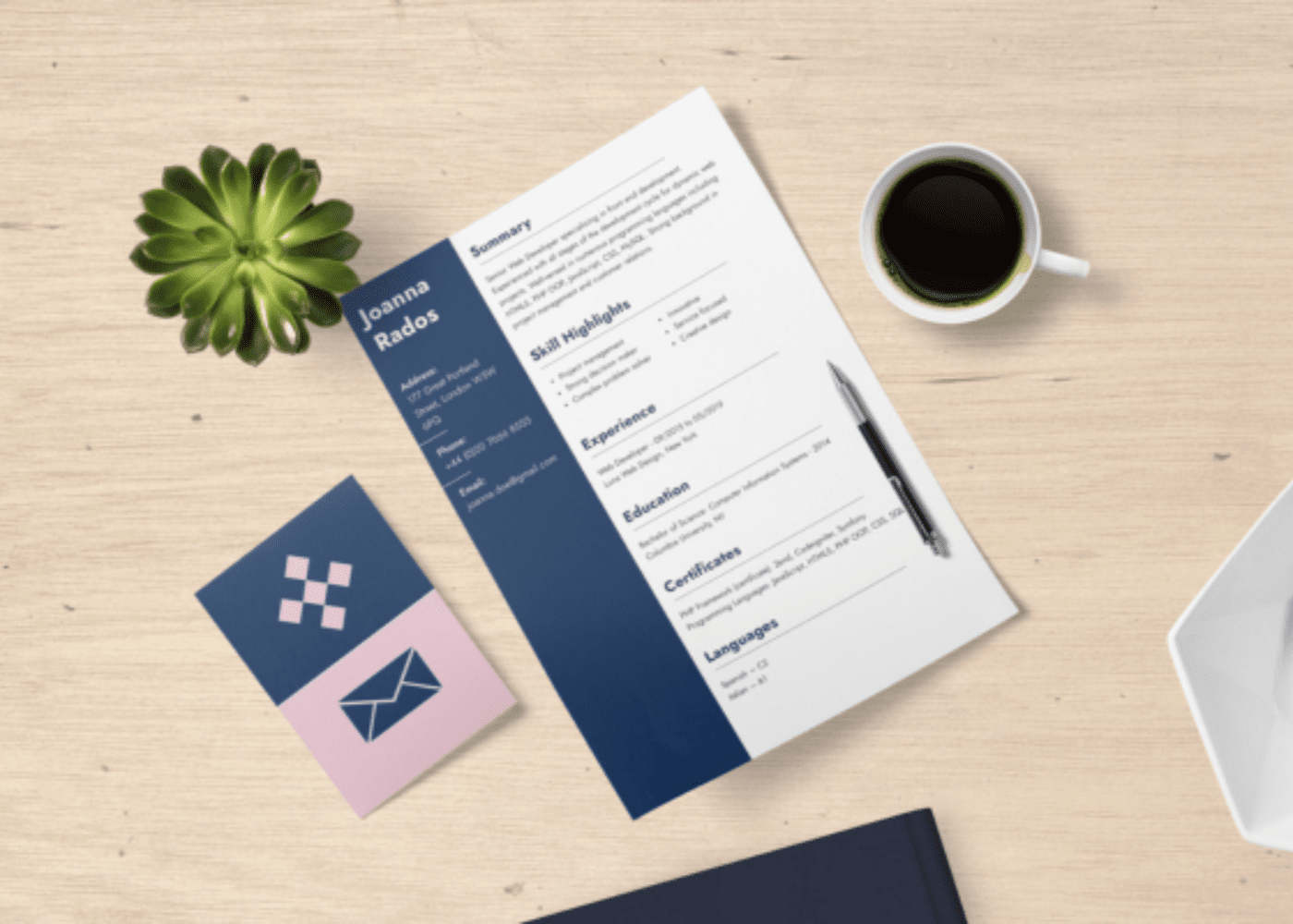 A resume on a desk with a cup of coffee