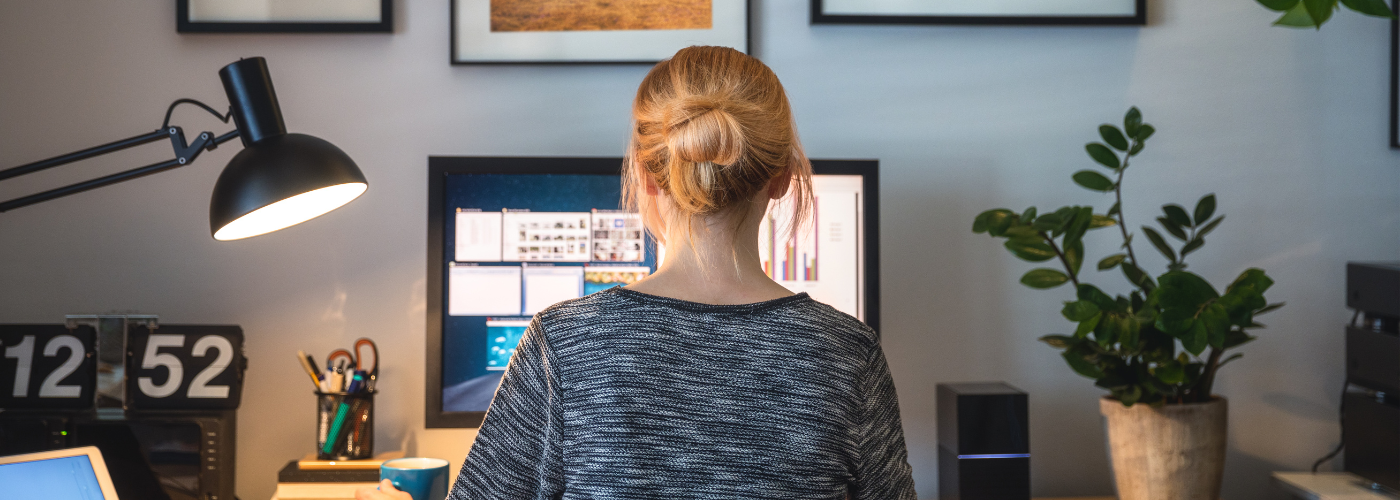 Women sitting in front of a computer while working from home