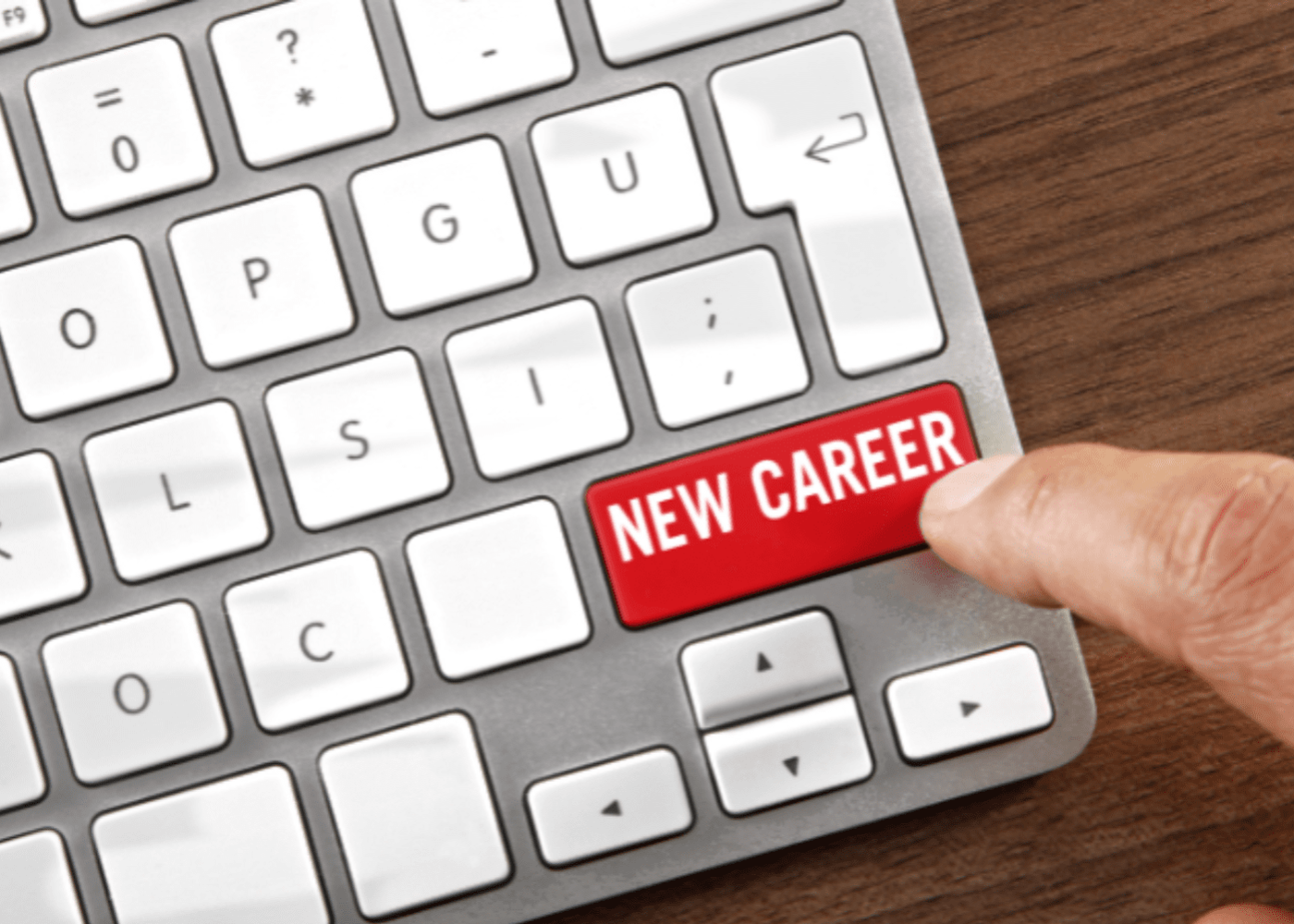 Keyboard with a button that says "career" being pushed by a finger