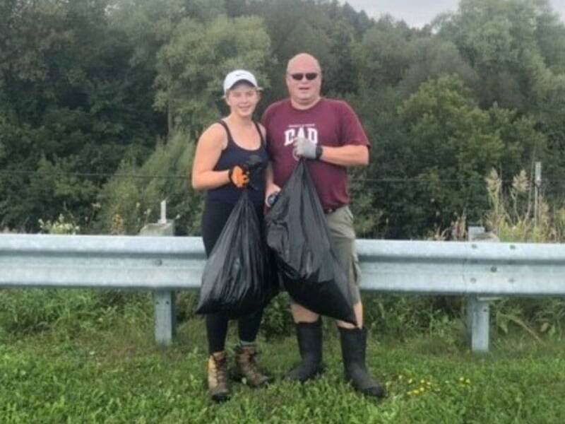 PeopleToGo employees volunteering to collect garbage